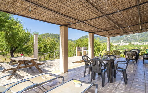 Es Puig Mancor: Table, Furniture, Property, Plant, Chair, Shade, Tree, Interior Design, Outdoor Furniture, Leisure