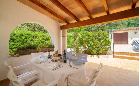 Ullastro Pollença: Furniture, Table, Property, Plant, Chair, Flowerpot, Houseplant, Interior Design, Wood, Tableware