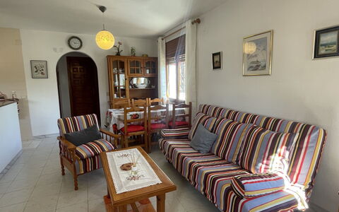 Zaragoza: Picture Frame, Furniture, Couch, Table, Wood, Interior Design, Living Room, Lamp, Floor, Building
