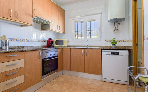 Villa Lolin: Countertop, Cabinetry, Property, Furniture, Kitchen Sink, Sink, Kitchen, Kitchen Stove, Kitchen Appliance, Wood