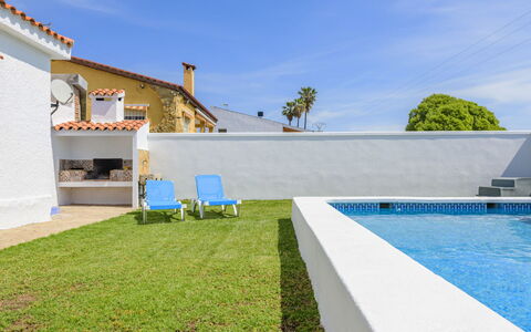 Villa Lolin: Sky, Building, Water, Cloud, Plant, Shade, Outdoor Furniture, Grass, Swimming Pool, Leisure