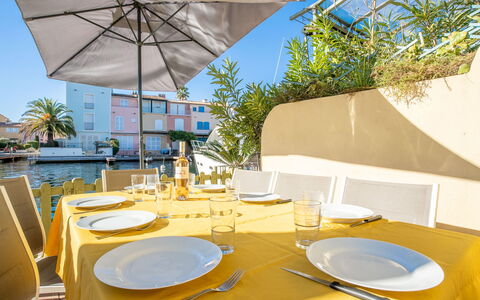 Bleu Azur: Table, Sky, Property, Furniture, Tableware, Dishware, Plant, Shade, Chair, Umbrella
