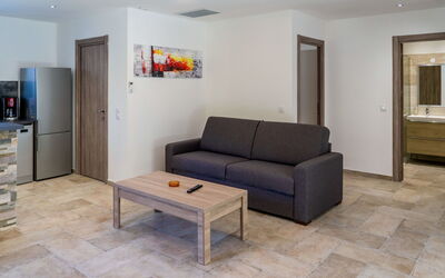A Suara 615.2: Furniture, Room, Property, Floor, Living Room, Interior Design, Building, Table, Real Estate, House