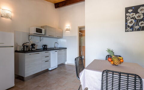 San Antoine: Furniture, Cabinetry, Property, Countertop, Table, Plant, Building, Chair, Wood, Drawer