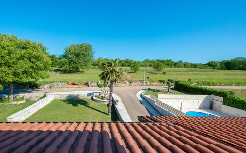 Medica: Roof, Natural Landscape, Property, Architecture, Sky, Grass, Tree, Botany, Real Estate, Garden