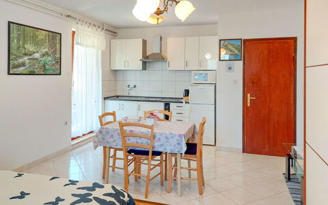 Kuki: Furniture, Property, Table, Cabinetry, Picture Frame, Chair, Wood, Interior Design, Lighting, Countertop