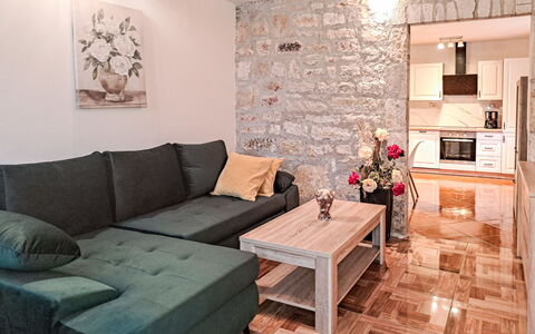 Glavica: Furniture, Couch, Flooring, Interior Design, Floor, Living Room, Wood, Table, Room, Lighting