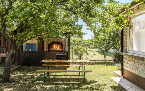 Petar: Plant, Building, Tree, Shade, Branch, Wood, Natural Landscape, Land Lot, Sky, Cottage