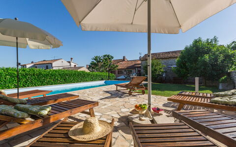 Villa Paula: Sky, Plant, Property, Umbrella, Light, Azure, Shade, Botany, Outdoor Furniture, Tree