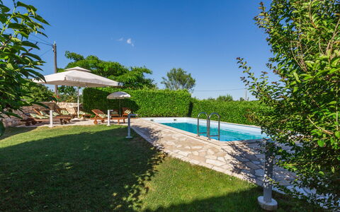 Villa Paula: Water, Plant, Sky, Swimming Pool, Building, Azure, Tree, Shade, Outdoor Furniture, Urban Design