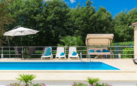 Liberat: Plant, Water, Sky, Property, Azure, Shade, Tree, Umbrella, Outdoor Furniture, Swimming Pool