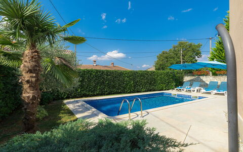 Paula: Plant, Sky, Cloud, Azure, Tree, Shade, Land Lot, Water, Outdoor Furniture, Grass