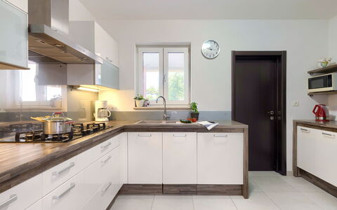 Villa Vela: Cabinetry, Tap, Kitchen Sink, Countertop, Sink, Property, Plumbing Fixture, Wood, Kitchen Stove, Kitchen