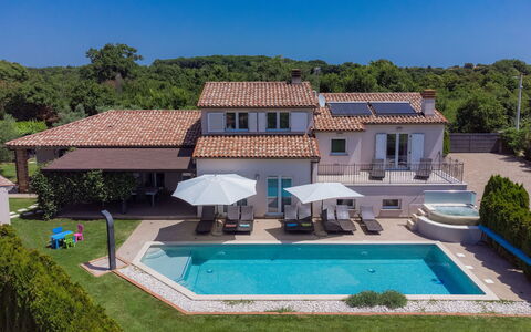 Villa Vela: Sky, Plant, Building, Property, Water, Swimming Pool, Blue, Nature, Azure, Shade