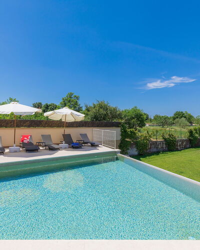 Andrea: Water, Sky, Property, Swimming Pool, Plant, Azure, Rectangle, Building, Cloud, Shade