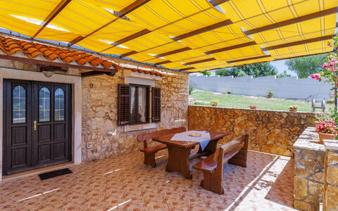 Laura: Shade, Awning, Wood Stain, Chair, Eco Hotel, Outdoor Furniture, Patio, Swimming Pool, Houseplant, Flagstone