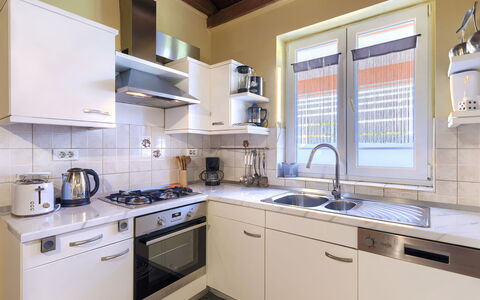 Cherry: Cabinetry, Kitchen Sink, Tap, Countertop, Sink, Plumbing Fixture, Window, Kitchen Stove, Kitchen, Interior Design