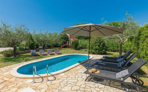 Gea: Water, Sky, Property, Plant, Furniture, Swimming Pool, Shade, Outdoor Furniture, Chair, Building