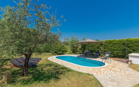 Gea: Water, Sky, Plant, Azure, Natural Landscape, Swimming Pool, Shade, Outdoor Furniture, Grass, Leisure