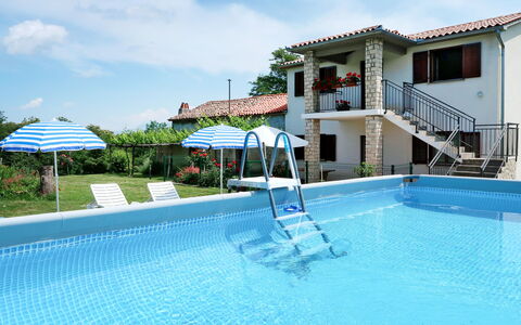 Fortica: Water, Cloud, Sky, Plant, Swimming Pool, Building, Azure, Chair, Window, Outdoor Furniture