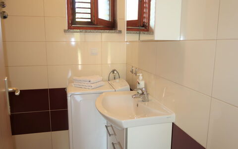 Fortica: Mirror, Tap, Sink, Plumbing Fixture, Bathroom Sink, Window, Bathroom, Interior Design, Wood