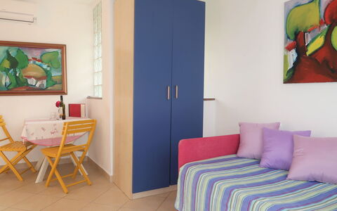 Adalgisa: Furniture, Property, Green, Blue, Azure, Interior Design, Comfort, Wood, Picture Frame, Table