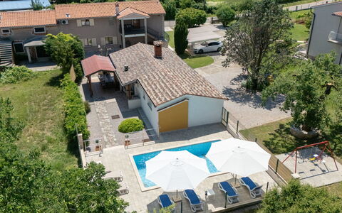 Verbanac: Swimming Pool, Residential Area, House, Roof, Home, Human Settlement, Resort, Urban Design, Estate, Suburb