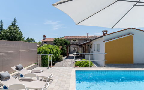 Verbanac: Swimming Pool, Outdoor Furniture, Umbrella, Resort, Residential Area, Furniture, Composite Material, Chair, Shade, Sunlounger