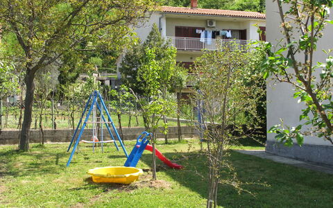 Villa Palma: Swing, Backyard, Outdoor Play Equipment, Yard, Public Space, Playground, Property, Grass, Human Settlement, Tree