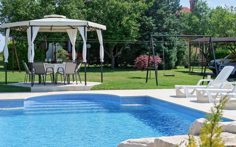 Andrea: Swimming Pool, Property, Leisure, Backyard, Real Estate, Home, Grass, House, Landscaping, Building