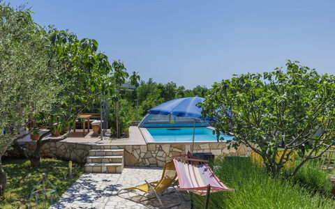 Laura: Plant, Sky, Plant Community, Shade, Outdoor Furniture, Tent, Umbrella, Tree, Landscape, Leisure