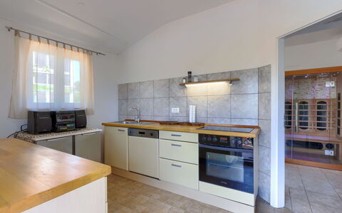 Laura: Countertop, Cabinetry, Kitchen Sink, Sink, Tap, Kitchen Stove, Kitchen, Wood, Window, Building