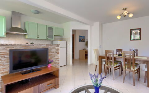 Carla: Furniture, Property, Table, Cabinetry, Wood, Living Room, Picture Frame, Flooring, Floor, Interior Design