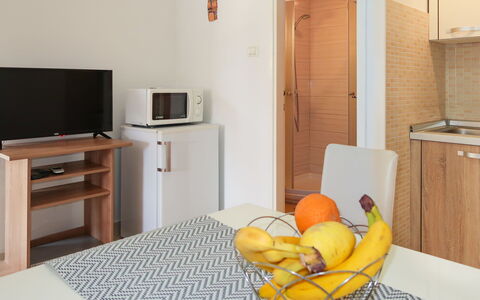 Klaudija: Cabinetry, Furniture, Property, Comfort, Building, Chest Of Drawers, Wood, Orange, Drawer, Interior Design