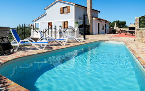 Stella: Water, Sky, Property, Plant, Building, Swimming Pool, Blue, Azure, Window, House