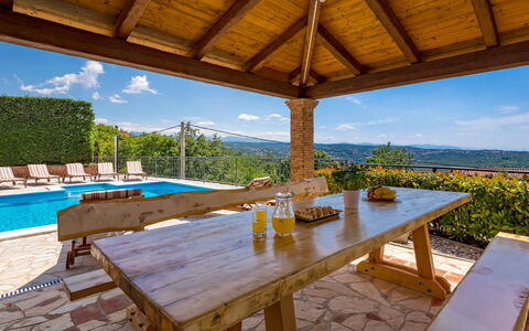 Villa Toni: Sky, Table, Furniture, Property, Plant, Nature, Water, Cloud, Wood, Outdoor Furniture