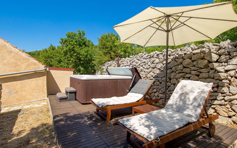 Tomiceva: Furniture, Property, Plant, Sky, Shade, Outdoor Furniture, Wood, Tree, Umbrella, Building