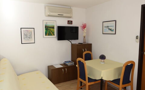 Tin: Furniture, Table, Picture Frame, Property, Building, Wood, Interior Design, Comfort, Floor, Flooring