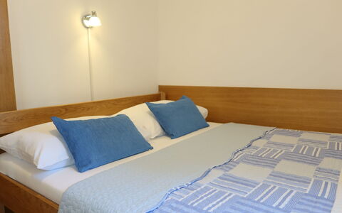 Tin: Furniture, Property, Comfort, Azure, Pillow, Textile, Wood, Interior Design, Floor, Bed Frame