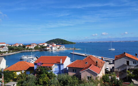 Ines: Water, Cloud, Sky, Building, Daytime, Property, Nature, Azure, Architecture, Coastal And Oceanic Landforms