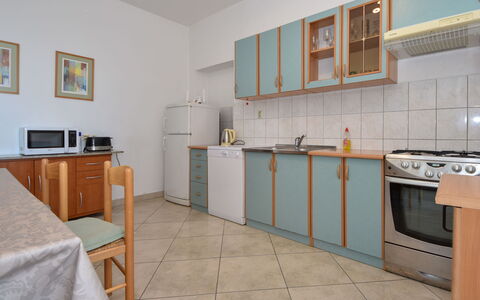 Ines: Cabinetry, Furniture, Kitchen Sink, Countertop, Building, Sink, Tap, Kitchen Appliance, Kitchen Stove, Wood