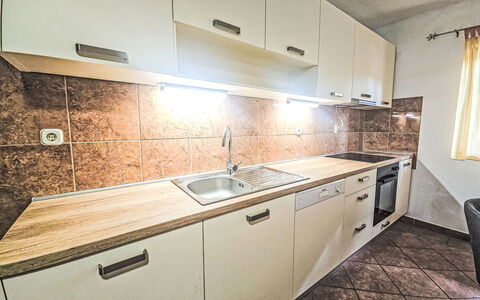 Gorana: Kitchen, Countertop, Major Appliance, Flooring, Wood, Kitchen Appliance, Interior Design, Cabinetry, Floor, Plumbing Fixture