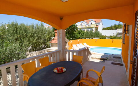 Gorana: Table, Sky, Furniture, Property, Plant, Chair, Nature, Building, Shade, Interior Design