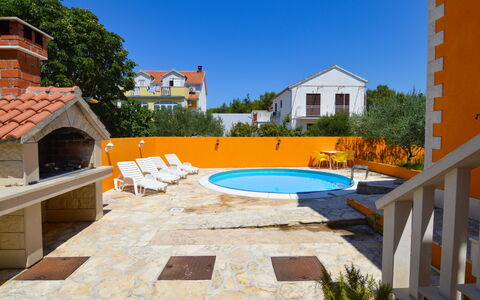 Gorana: Sky, Building, Property, Plant, Window, Swimming Pool, Water, Azure, Tree, Outdoor Furniture
