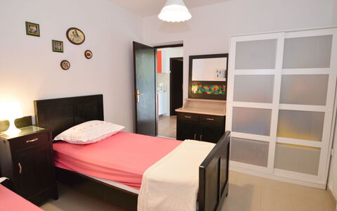Lila: Furniture, Cabinetry, Comfort, Building, Picture Frame, Wood, Door, Bed Frame, Lighting, Interior Design
