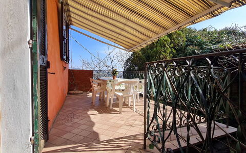Agnese (Dol235): Sky, Property, Shade, Wood, Plant, Outdoor Furniture, Tree, Real Estate, Tints And Shades, Table