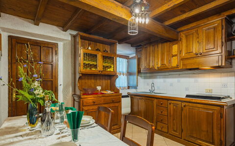Vincio: Furniture, Room, Cabinetry, Property, Countertop, Building, Interior Design, Kitchen, Lighting, Home