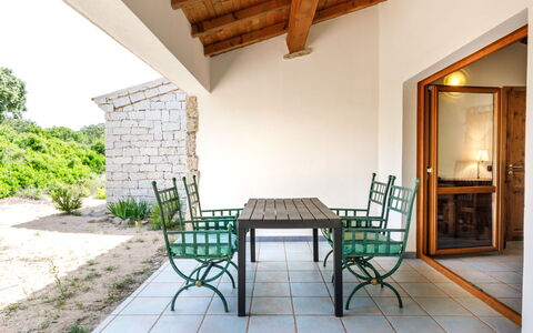 Mare di Ginepri (Bad115): Table, Plant, Furniture, Building, Chair, Wood, Interior Design, Shade, Floor, Outdoor Furniture