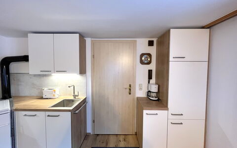 Wallner: Countertop, Wood, Flooring, Kitchen, Interior Design, Furniture, Sink, Cabinetry, Floor, Plumbing Fixture
