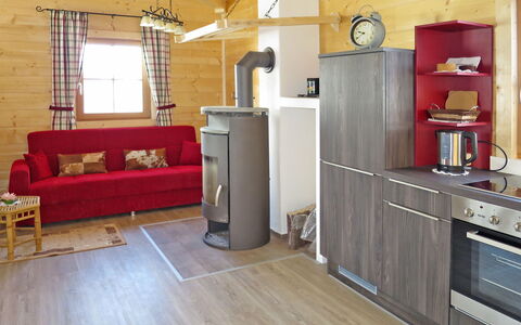 Waltl: Room, Floor, Furniture, Property, Red, Interior Design, Building, Wood Flooring, Hardwood, Living Room